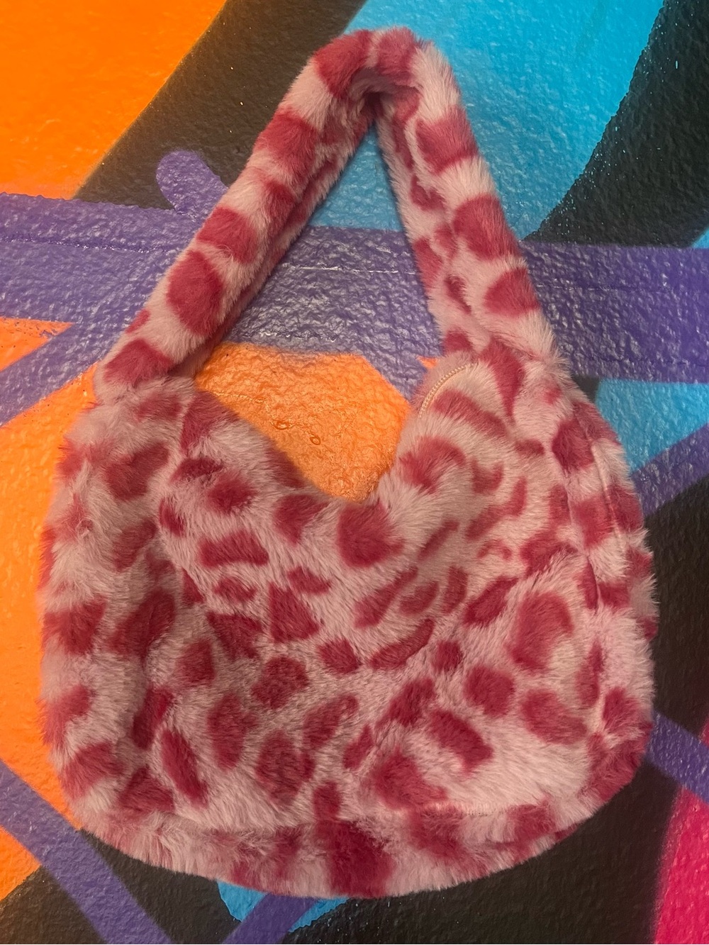 Pink leopard print faux fur handbag